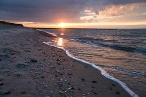 Sunset on the Baltic Sea. Sea, bean strong colors. Vacation on the beach. Landscape photo