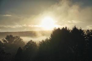 sunrise with fog in the early morning hours. photo