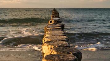 the Baltic Sea through the sea to the horizon at sunset. Romantic mood photo