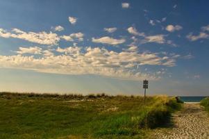 Beach crossing on the Baltic Sea with a view of the sea. photo