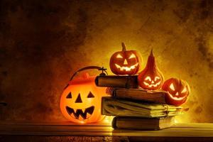 Halloween pumpkins of night spooky on wooden photo