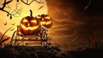 Halloween pumpkins on farm wagon at spooky in night of full moon and bats flying photo