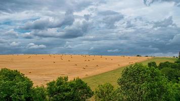 Cornfields on which bales of straw remain after harvest. Wheat was harvested. photo