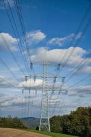 High voltage overhead power lines distributed across the country photo