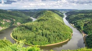 Saarschleife view from tree top walk tower. A lookout tower in Saarland. Pure nature. photo