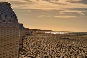 beach chair on the beach of the baltic sea with view of the sea photo