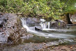 swedish brook, rivers with small and big waterfalls photo