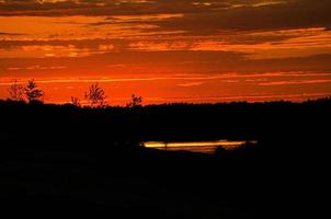 burning sky. Sunset with extreme colors. clouds and light atmosphere photo