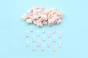 Marshmallow rain cloud. Cute metaphorical weather concept photo
