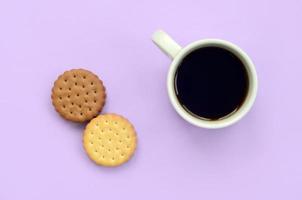 Coffee break flat lay composition with sandwich cookies photo