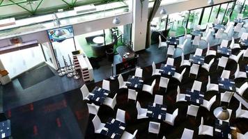 Top view of table and chair at restaurant. Object and interior design photo