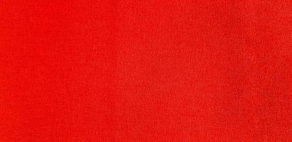 Textured of red sofa surface for background or wallpaper. Soft material and Pattern concept photo