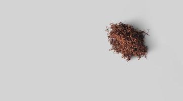 Raw tobacco against white background.top up view photo