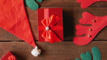 red gift box on wooden background for christmas video
