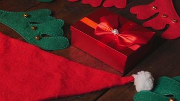 red gift box on wooden background for christmas video