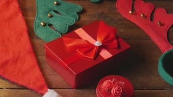 red gift box on wooden background for christmas video