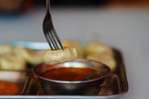 yummy momos with chilli shoes photo