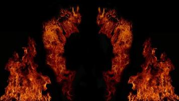 A beautiful flame shaped as imagined. like from hell, showing a dangerous and fiery fervor, black background photo