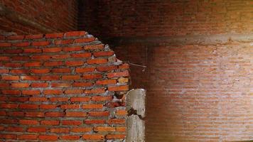 Close-up of the rubble of an industrial building collapsing into a pile of concrete and brick. and the jagged debris caused by the failure of the engineers at the abandoned construction. photo