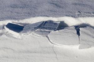 A large beautiful snowdrift of snow photo