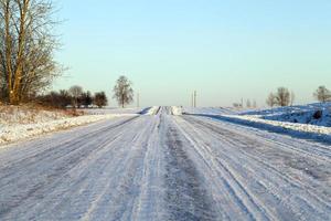 Track on a snow-covered road photo