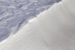 Large snowdrifts, close up photo