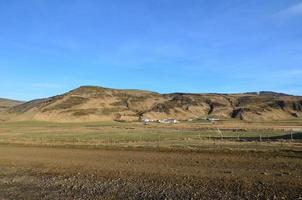 Pretty icelandic field with lots of dirt photo