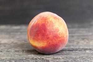 one ripe peach photo