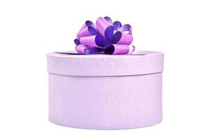 Round gift box with bow, isolated. photo