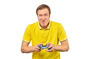 Funny handsome gamer with gamepad, excited video game player isolated on white background photo