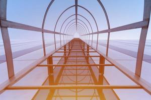 Stairway to Heaven concept. Fire escape staircase of modern shopping center. Emergency fire exit. Bottom view photo