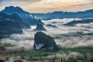 Landscape of Morning Mist with Mountain. photo