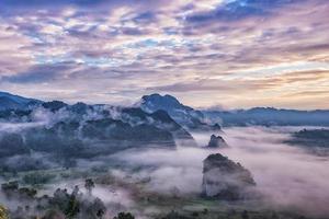 Landscape of Morning Mist with Mountain. photo