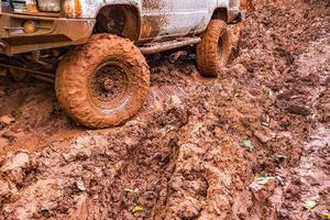 Tire tracks on a muddy road. photo