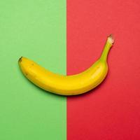 Banana on coloured background still life photo