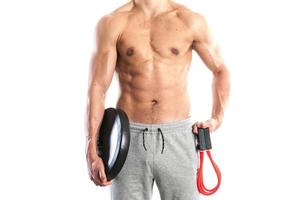 Fit, muscular male body photo