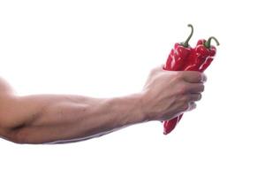 Raw food man holding vegetables and fruit photo