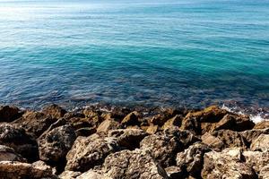 Blue ocean and rocks photo