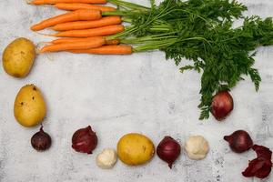 Vegetables on a rustic table photo