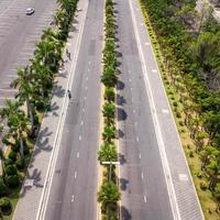 Miami Beach close to chalatat beach at Songkhla park, Thailand. Beautiful landmark of  Songkhla with coconut plam tree and road path. photo