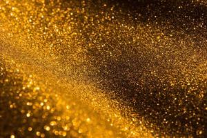 Gold glitter background, Gold abstract background with blurred bokeh, Abstract bokeh lights with soft light background.