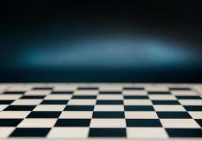 Chessboard on abstract background.  Business plan or game for kid photo