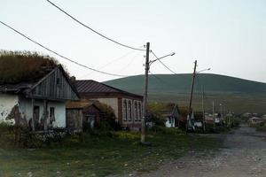 Old traditional house in Tambovka village old house by Paravani lake. Georgia sightseeing hidden gems photo