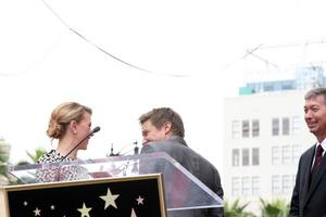 LOS ANGELES, MAY 2 - Jeremy Renner, Scarlett Johansson at the Scarlett Johansson Star Walk of Fame Ceremony at Hollywood Boulevard on May 2, 2012 in Los Angeles, CA photo