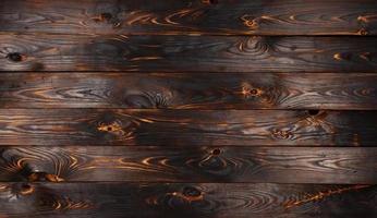 Burnt wooden board, black charcoal wood texture, burned barbecue background photo