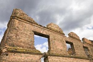 destroyed ancient brick wall photo