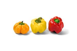 yellow and red peppers white background photo