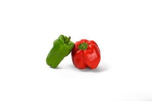 red and green peppers white background photo