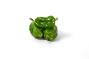 green bell pepper on white background photo