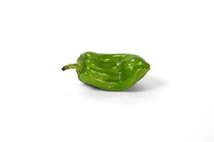 green bell pepper on white background photo